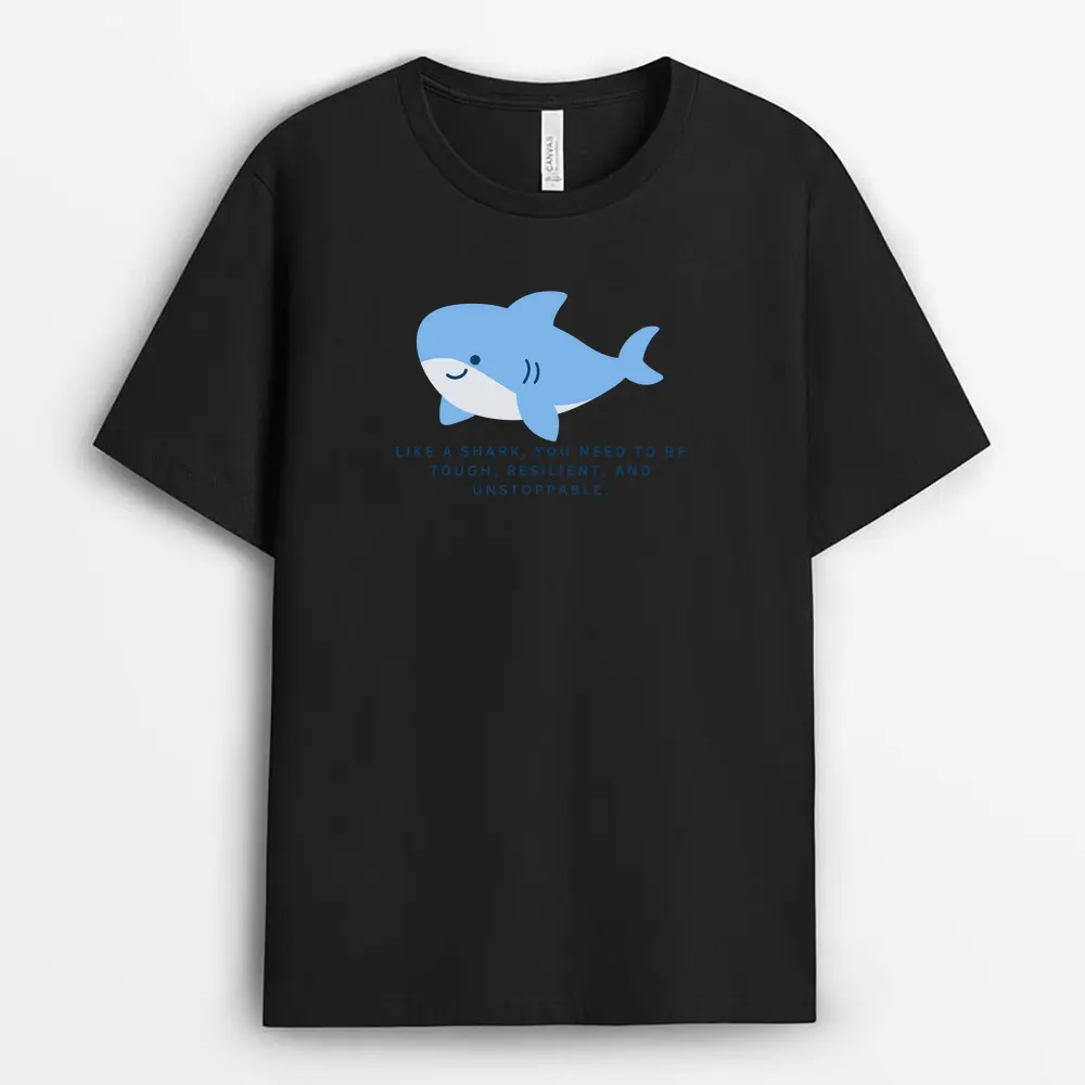 Black t-shirt with “Tough, Resilient, Unstoppable” shark quote, ocean-inspired design