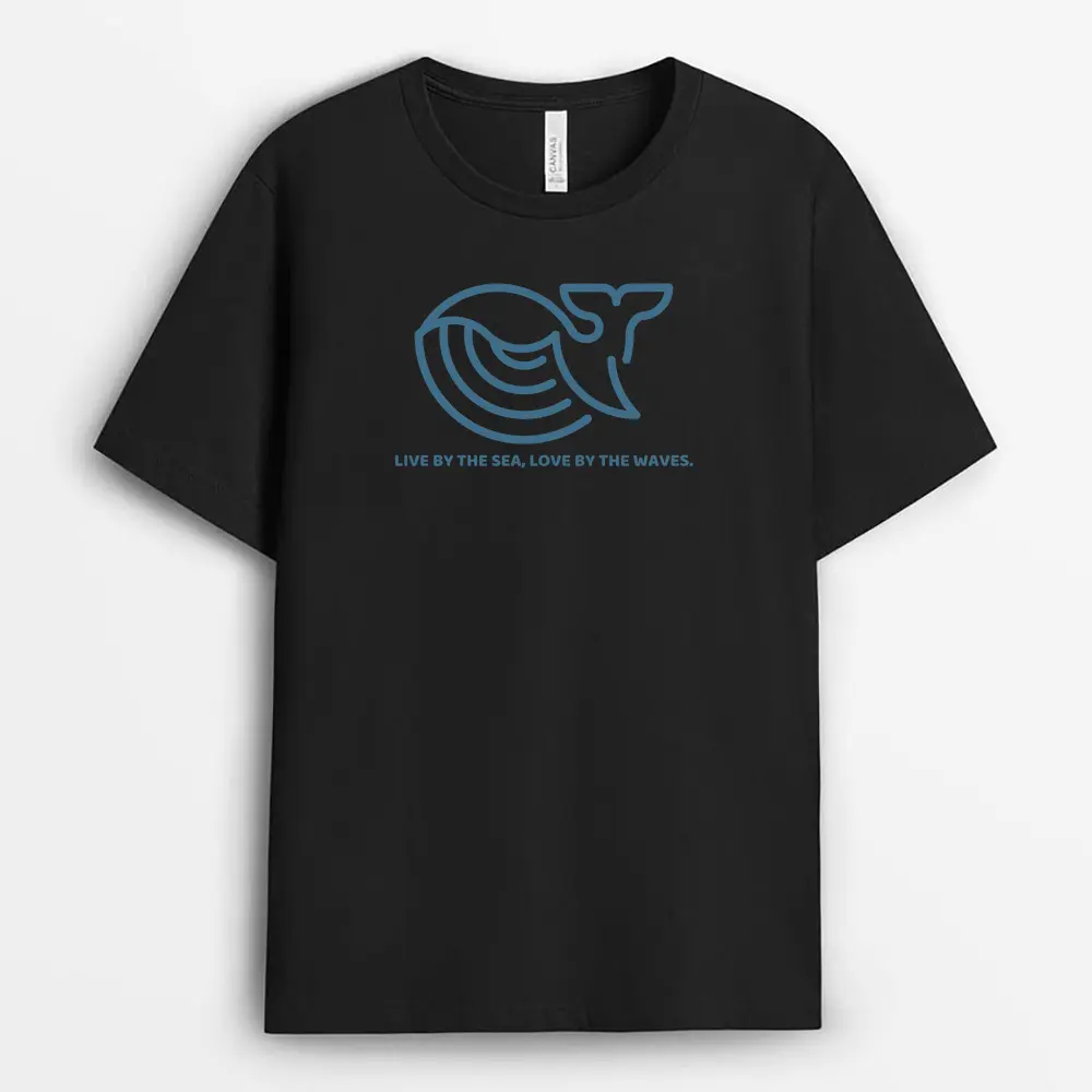 Black t-shirt with “Live by the Sea, Love by the Waves” text, coastal style
